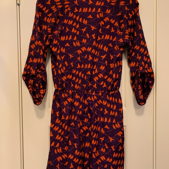 Unique purple dress with reddish orange birds. - Picture 3 of 7